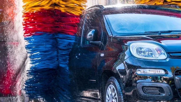 A car going through the Bubbles soft-touch wash